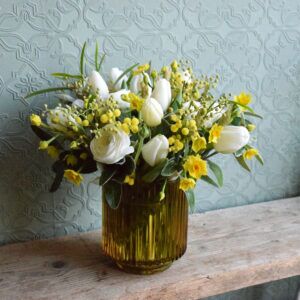 Sample of a luxury Spring flower vase arrangement in yellow and whites available to order from Kensington flowers London